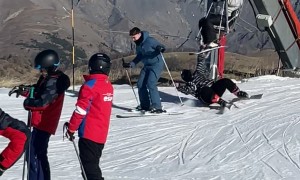 Ski Lift Rider Misses Dismount and Knocks Her Companion Down