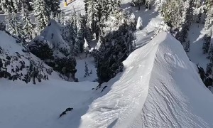 Skier Navigates Steep Cliff