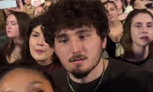 Guy gets accidentally recorded at the concert and his reaction is hilarious 