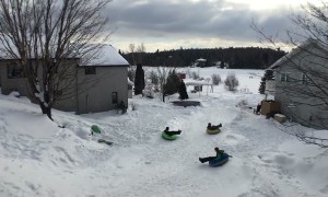 Tube Sledders Crisscross in the Air