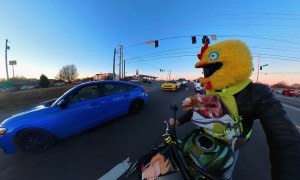 Motorcyclist Hands Out Flowers on Valentine's Day