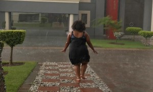 Playing And Slipping In The Rain