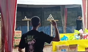 Carnival Game Player Falls Over Railing