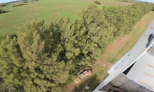 Worker Assembles Telecommunications Tower