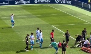 Football Player Races Paramedic Bag Across Pitch