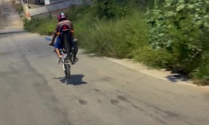 Motorbike Loses Wheel During Maneuver