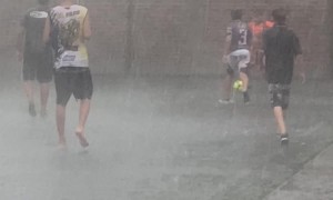 Playing Football In The Pouring Rain