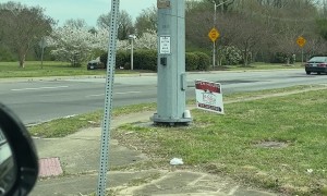 Husband's Tiny Yard Sale Sign Fails to Attract Customers