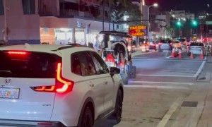 Woman Falls Off Back of Golf Cart