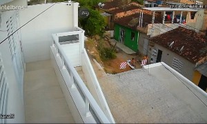 Woman Accidently Accelerates Motorcycle And Falls Off Ledge