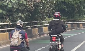 Guy Rides Mini Motorbike
