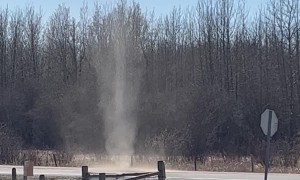 Dust Devil Rises High Into the Sky
