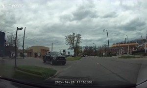 Pickup Crashes Into Parked Cars