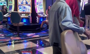 Man Struts By In Miniskirt And Stilettos