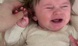 Baby Pulls Her Own Hair
