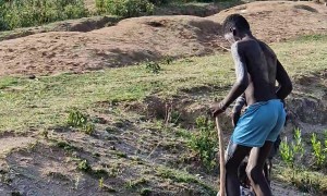 Members of the Banna Tribe Walking on Stilts in Ethiopia