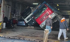 Strong Winds Tip Trucks In Ferry