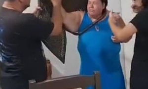 Woman Gets Stuck in Chair