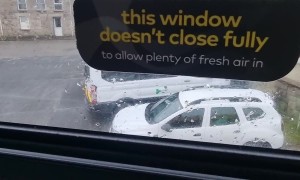 Silly Sign in Open Air Bus