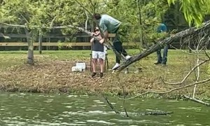 Woman Climbs on Precarious Tree Branch to Retrieve Fishing Line