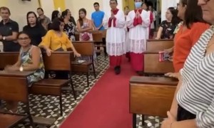 Dog Sleeps in Church During Mass