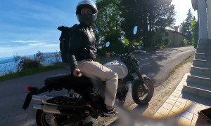Motorcyclist's Camera Smashes Into Roadside Planter