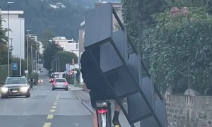Cyclist Carries Shelves on Bike