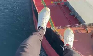 Paramotor Pilot Experiences Sudden Turbulence Over Cargo Ship