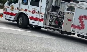 Vehicle Catches Fire Perilously  Close to Store