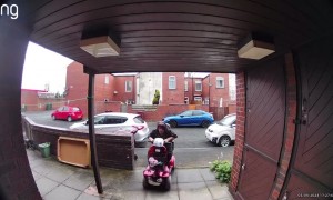 Nan Rolls Her Mobility Scooter Going Off Curb