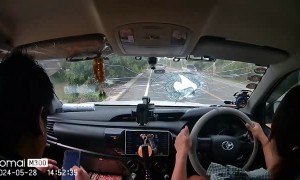 Passing Truck Sends Stray Rock Flying Into Windshield