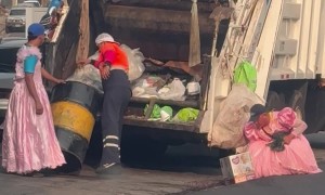 Trash Collectors Rock Pretty Pink Dresses