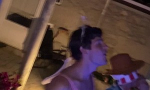 Party-Goers Watch Meteor Light Up Sky