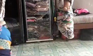 Putting Babies To Sleep In Traditional Kalimantan Bapukung Swings