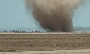 Driver Spots Huge Dust Devil in Field