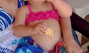 Baby Thinks 'Mmmm This Is A Reward'