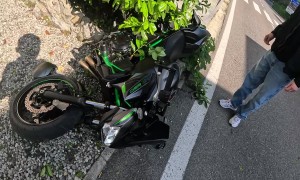 Motorcycle Rider Takes It A Bit Too Wide