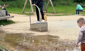 Mischievous Uncle Sprays Nephew With Water