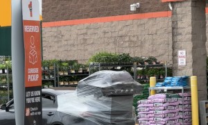 Shopper Uses Plastic Wrap to Transport a BBQ Grill