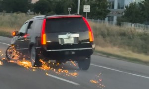 Car Drives on Highway With Missing Tire