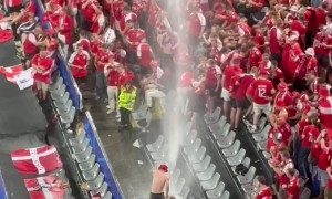 Danish Football Fans Dance In the Rain