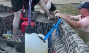 Big Guy Struggles to Get Back Into Boat