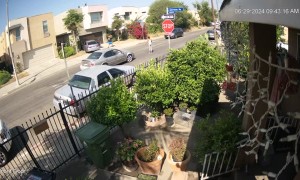 Vehicle Collision Caught on Security Camera