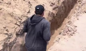 Man Trips While Running Through Ditch