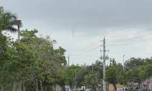 Funnel Cloud Forms Near Sunrise, Florida