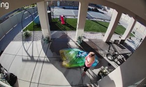 Woman Tries to Move a Splash Pad and Ends Up Flying Backwards