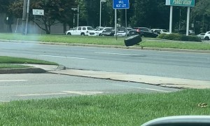 Wheel on the Loose Crashes Into Car