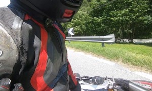 SUV Hits Oncoming Motorcyclist