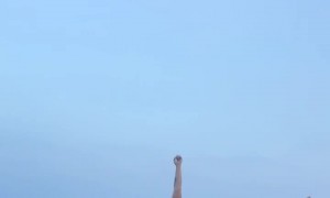 Guy On Boat Tries to Participate In Beach Yoga