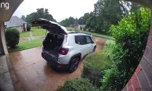 Woman Runs Into Garage Door While Trying to Protect Hair